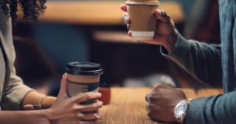 Firefly create a realistic image of a professional creative coaching a client; African American, fem Small